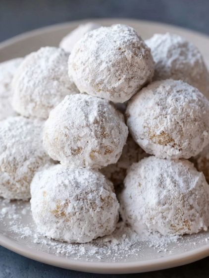 A plate of snowball cookies.