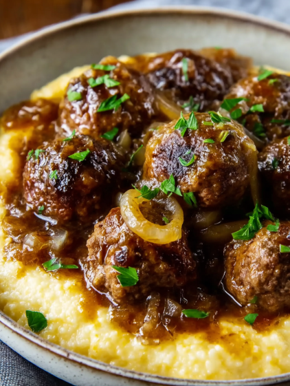 Slow cooker meatballs with onions.
