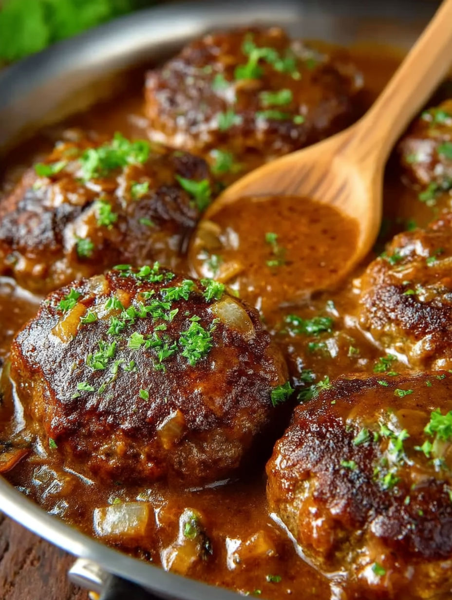 A bowl of meatballs in a brown sauce.