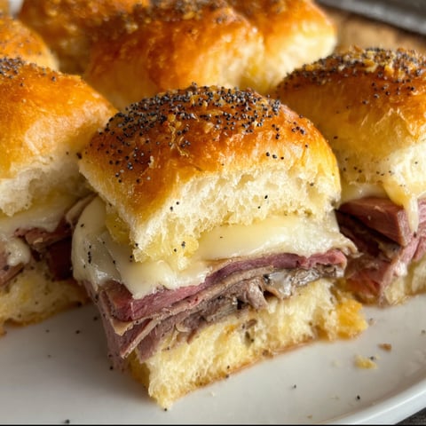 Roast beef sliders on Hawaiian rolls.